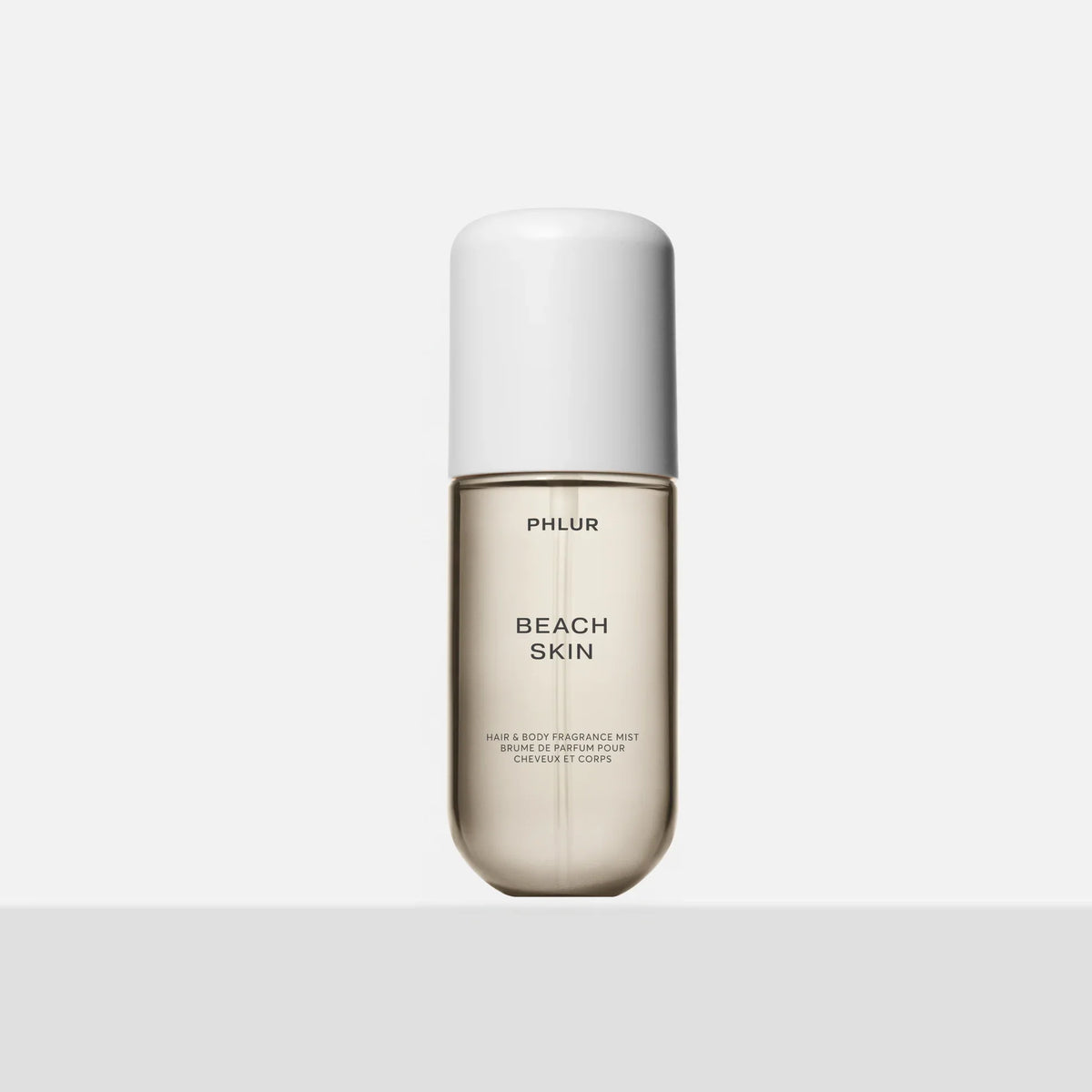 Phlur Beach Skin hair and body fragrance mist 3 FL OZ travel size bottle